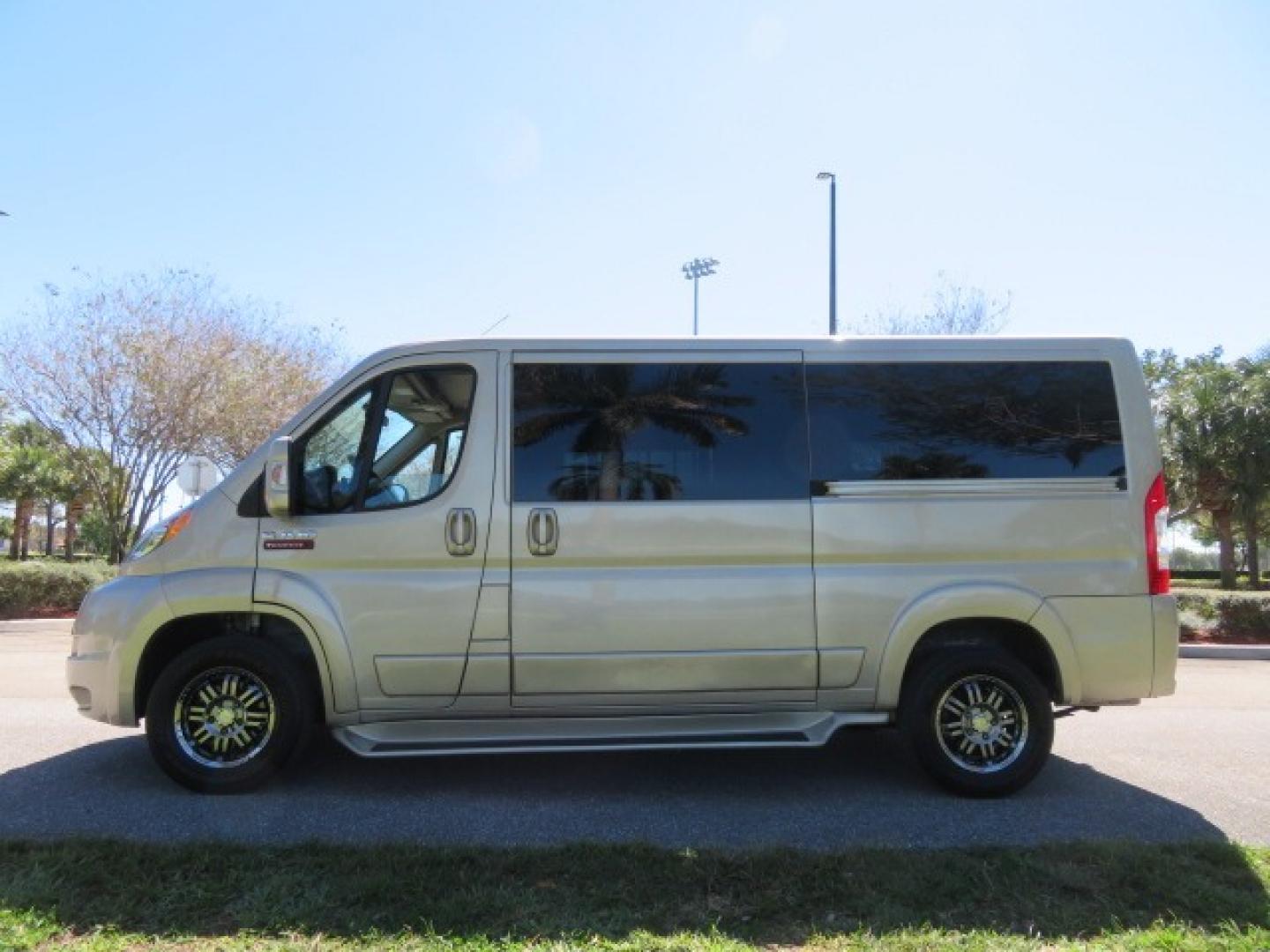 2016 Gold /Tan and Black Leather RAM Promaster (3C6TRVAG5GE) , located at 4301 Oak Circle #19, Boca Raton, FL, 33431, (954) 561-2499, 26.388861, -80.084038 - You are looking at a Gorgeous 2016 Ram Promaster Tempest X Handicap Wheelchair Conversion Van with 30K Original Miles, Lowered Floor, Dual Side Entry Doors, Power Passenger Side Entry Door, 750lb Braunability Wheelchair Lift, 4 Passenger Rear Power Bench Seat/Bed, Navigation, Rear Entertainment, Sur - Photo#14